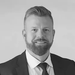 A Black And White Photo Of A Man In A Suit And Tie, Showcasing Toronto Web Design.